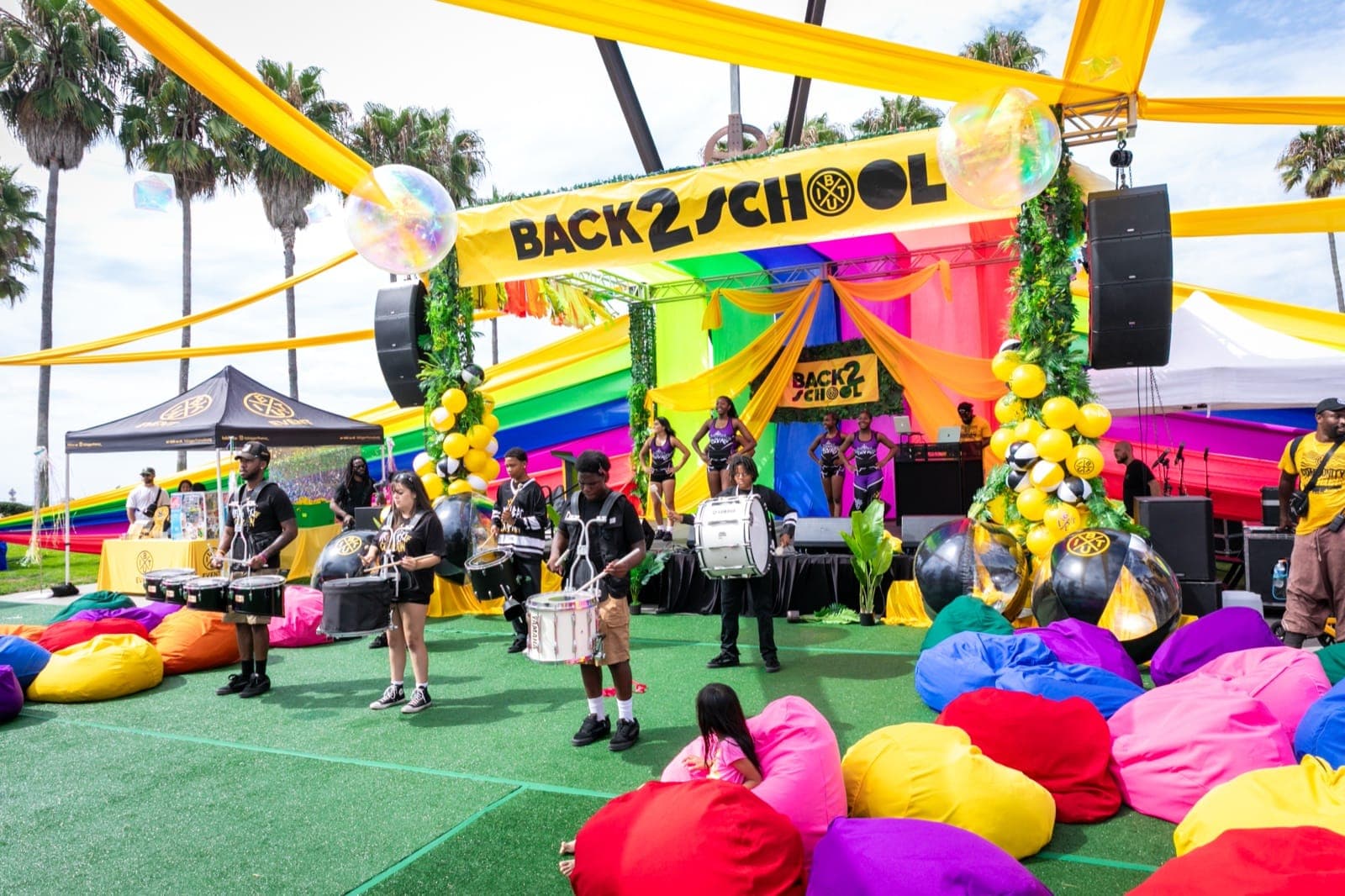 Back 2 School drumline performing on the main stage.