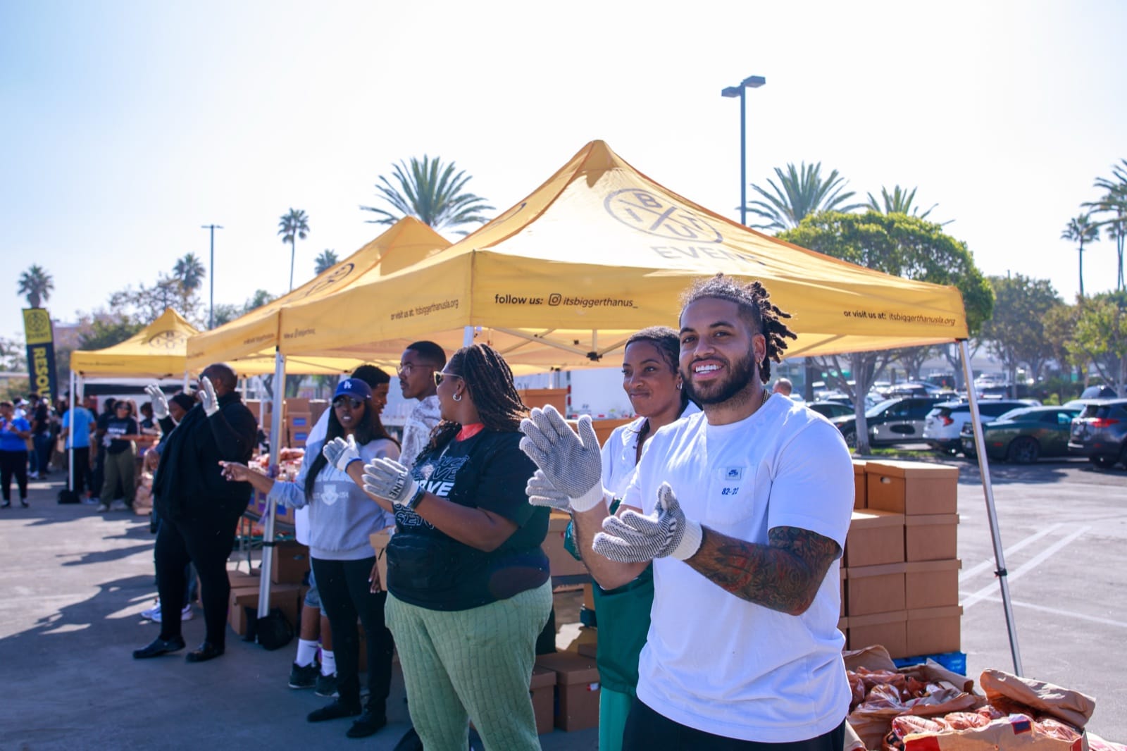 Community members receiving fresh produce at an IBTU food distribution